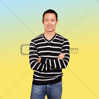 Asian man in striped pullovert