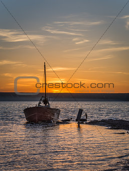 Old Abandoned Boat at Sunset