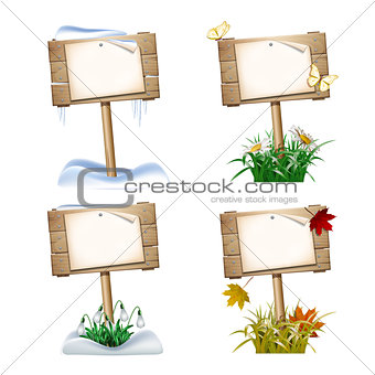 Set of wooden signs in four seasons.