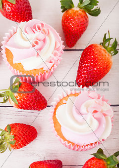 Cupcake muffin with strawberry cream dessert