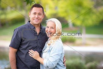 Young Caucasian Couple Portrait In The Park