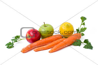 Fruits on a white background. Lemon with apples and kiwi on white background. Kiwi with lemon on a white background. Carrots with fruits on a white background.