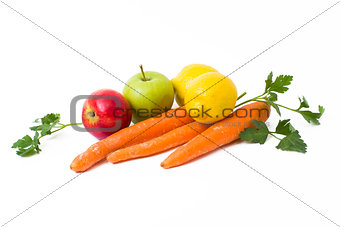 Fruits on a white background. Lemon with apples and kiwi on white background. Kiwi with lemon on a white background. Carrots with fruits on a white background.