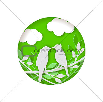 Paper bird on a green background