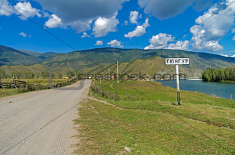 A road sign with the name of the village.  Altai, Russia.