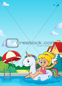Girl floating on inflatable unicorn 4