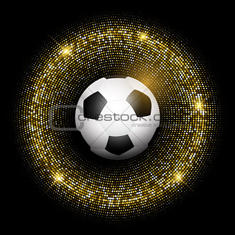 Football / soccer ball on glittery gold background 