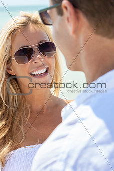 Woman Man Couple Wearing Sunglasses on a Beach