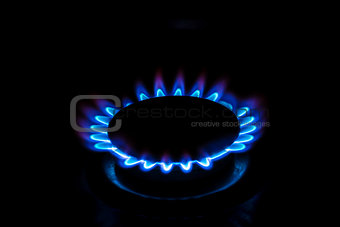 A gas burner with blue burning gas