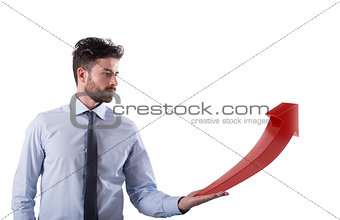 Businessman holds a growing statistic company