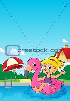 Girl floating on inflatable flamingo 3