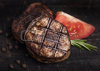 Grilled juicy beef pork steak slice on wood