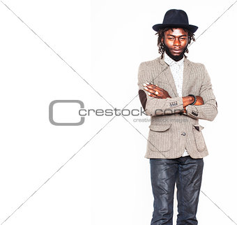 young handsome afro american boy in stylish hipster hat gesturin