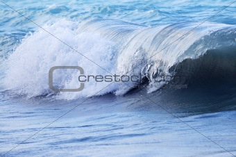 Wave in stormy ocean