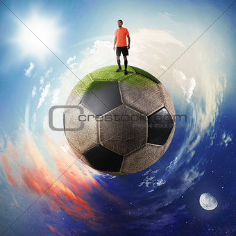 Football player in a soccer ball planet