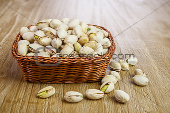 Pistachios on wooden table