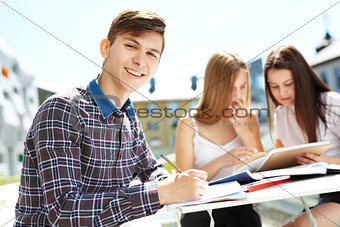 Portrait of three high school students spending time together