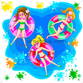 Girls swim with an inflatable circle