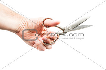 Large scissors in male hand
