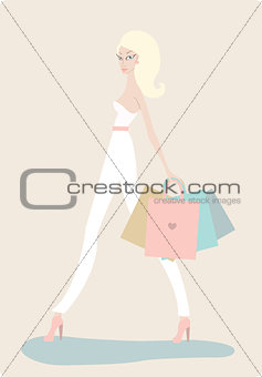 Young beautiful woman with shopping bags on light background