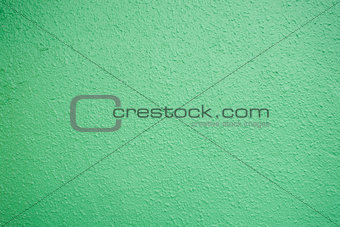 pastel green plastered wall texture background