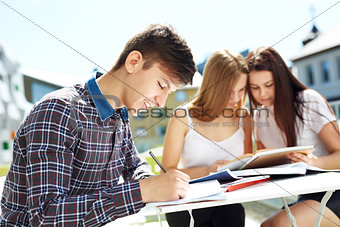 Portrait of three high school students spending time together
