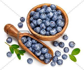 Berry blueberry in wooden dish with scoop