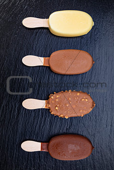 Ice cream on stick covered with chocolate 