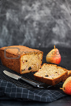 Fresh homemade delicious loaf cake with pears and prunes
