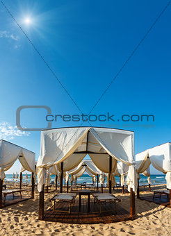 Tents canopies on sunshiny beach