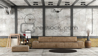 Living room in a loft with concrete and brick wall