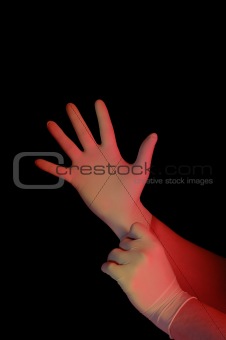 Mans hand putting on the glove