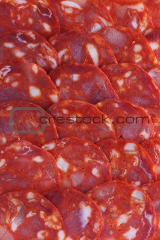 spanish chorizo sausage pieces background