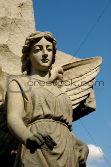 Solemn Female Angle with Wings on Granite Cross
