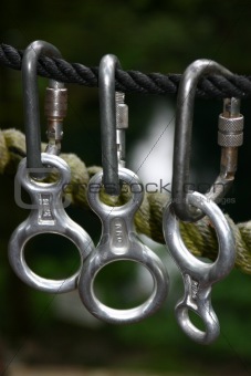 Carabiners hanging from cable