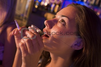 Woman Drinking In Bar