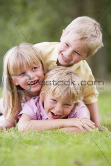 3 children playing outside