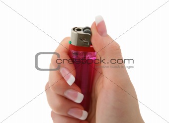 female hand holding a lighter