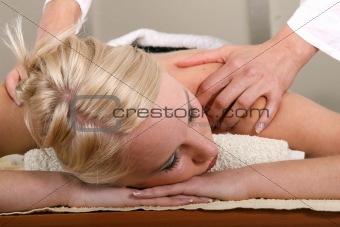 Massaging braced Shoulders