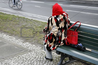 Lady looking at the traffic - Berlin