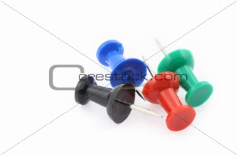 colorful pushpins on white