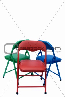 red blue and green chairs isolated on white
