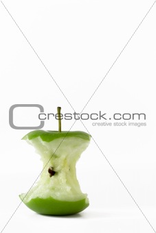 Fresh green apple eaten to the core
