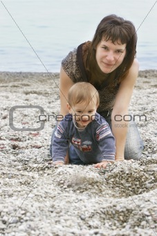 mother and son on beach