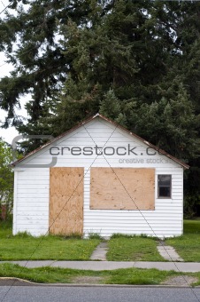 boarded-up house