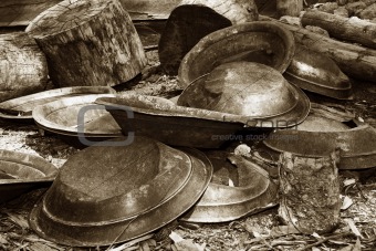 gold pans in sepia