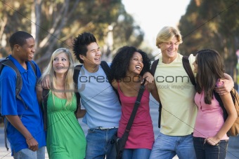 Group of young friends chatting outside