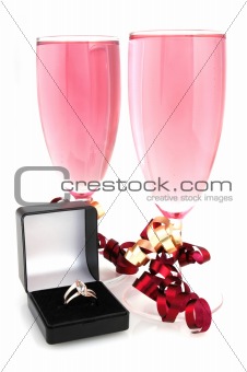 pink champagne and wedding ring