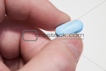 Fingers,blue tablet
