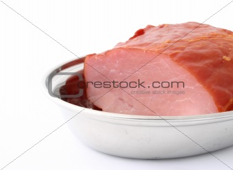 juicy loin inside a metal platter